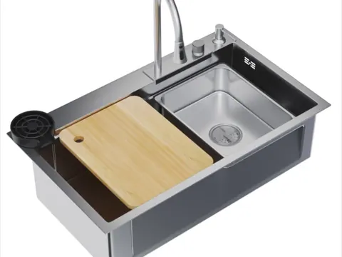Workstation sink with a hardwood board, colander and top loading waterfall faucet