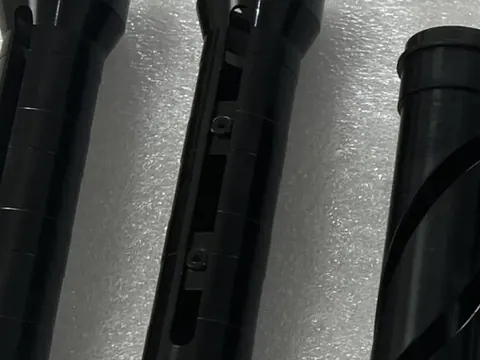 Anodised black machined housings and tube assemblies produced to customer drawings