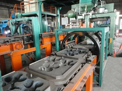 Sand coated iron mould production line