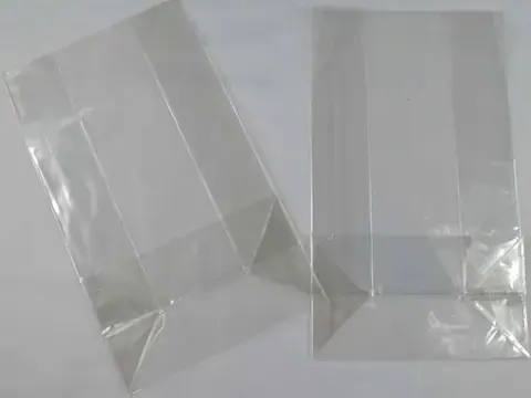 Two clear plastic packaging bags on white background