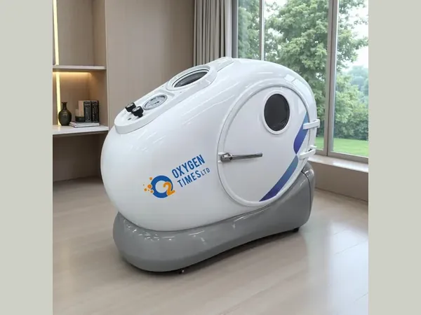 OHE20 stainless-steel hard-shell sitting chamber in a residential room — Oxygen Times (Nanjing HBOT Chamber Factory)