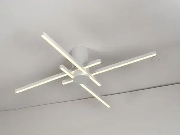 SX2313-4C four arm ceiling light lit in a room — Decorative lighting manufacture in China