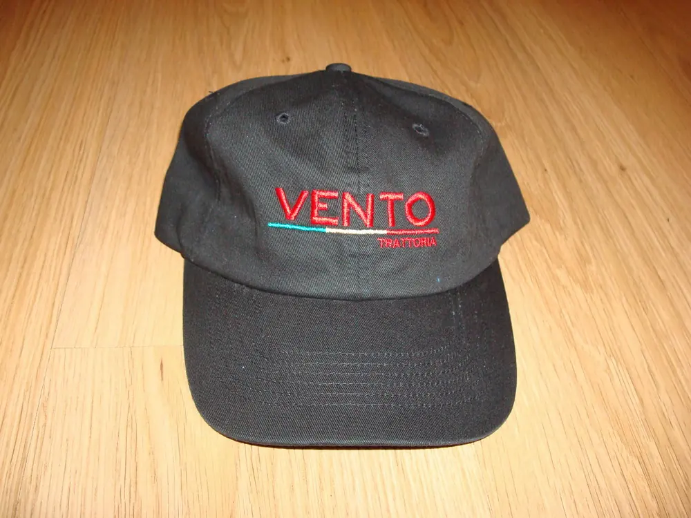 Black Cap With Red Embroidered Wordmark