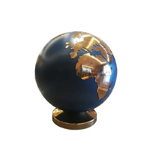 Decorative globe sculpture with dark blue oceans and metallic gold continents on a gold base.