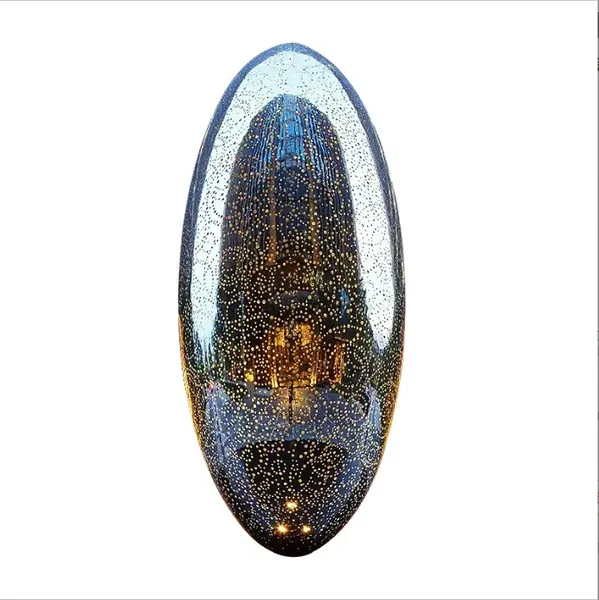 Oval convex mirror reflecting a ceiling with numerous small lights