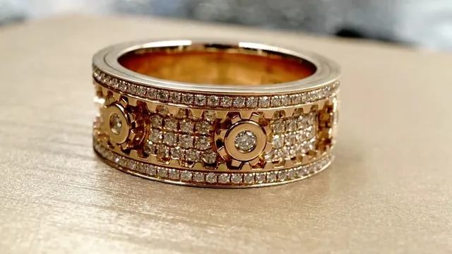 An ornate 18K rose gold diamond band ring photographed at the BH Jewelry bench
