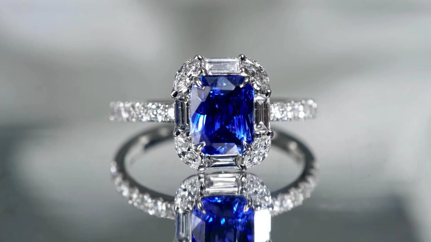 Blue Sapphire And Diamond Halo Engagement Ring photographed at the BH Jewelry workshop in Shenzhen