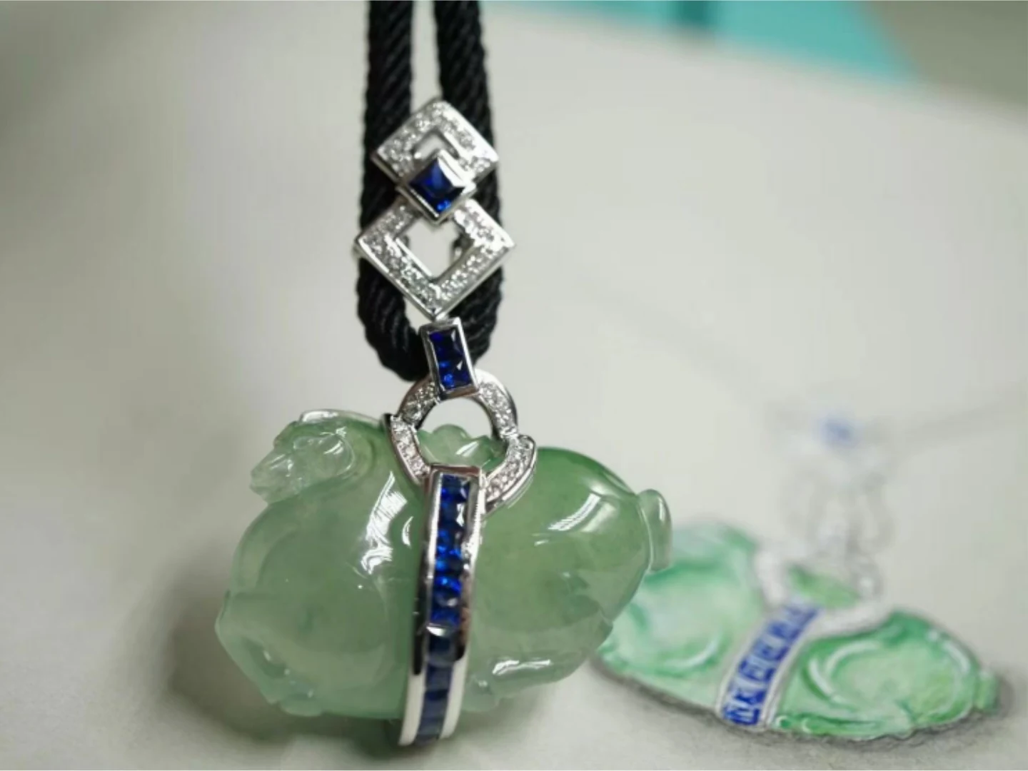 Jadeite Squirrel Pendant With Natural Diamonds photographed at the BH Jewelry workshop in Shenzhen