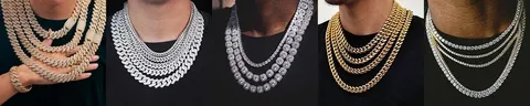 A row of Cuban link and تنس chains displayed on busts