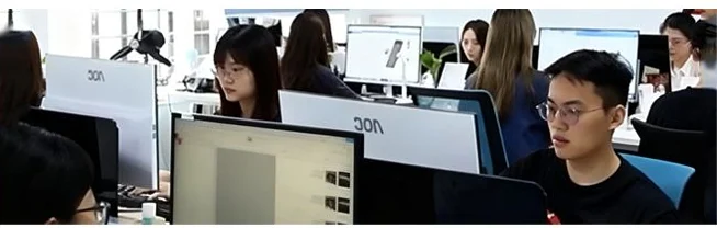 The BlueOne Jewelry design and R and D team working at their computers