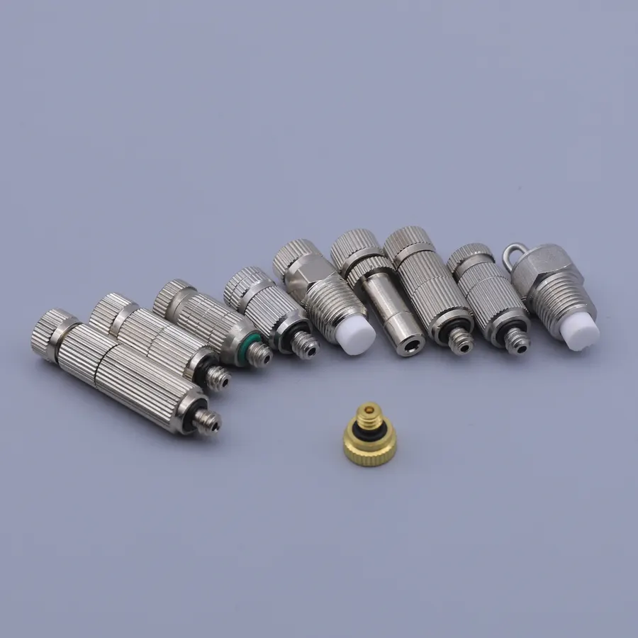 Misting nozzles and fittings