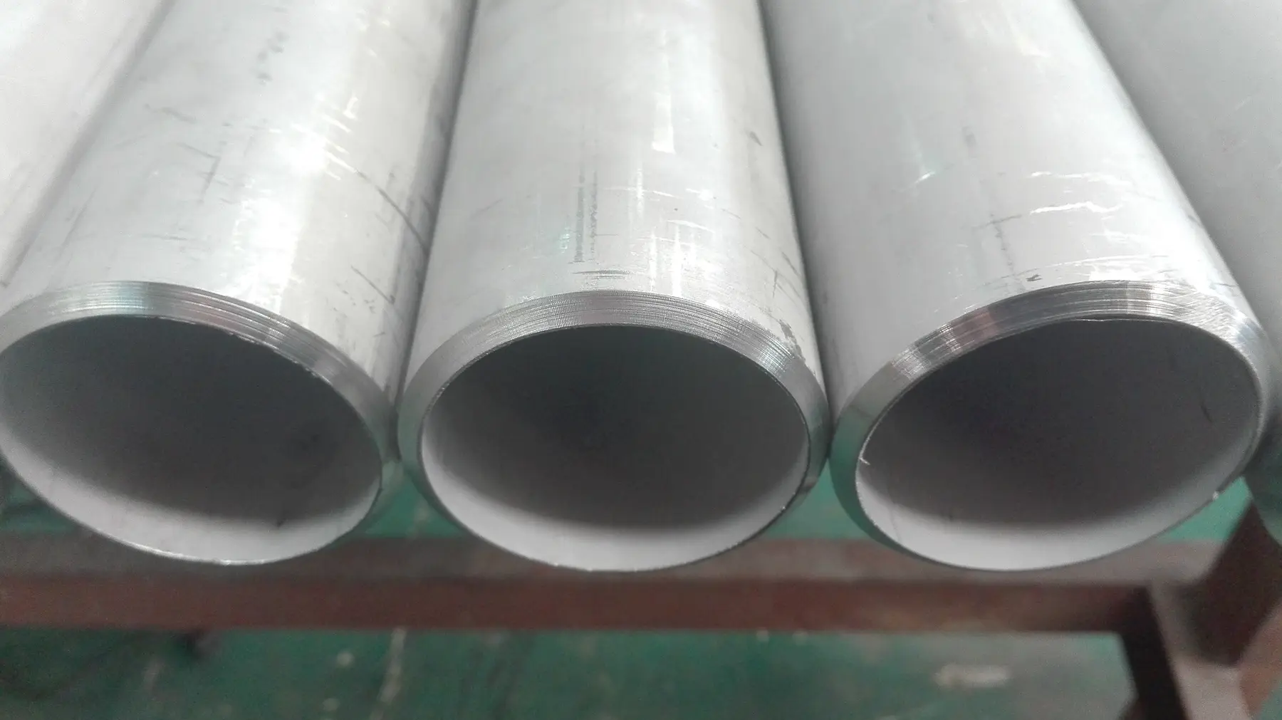 Duplex stainless steel tube ends showing wall thickness