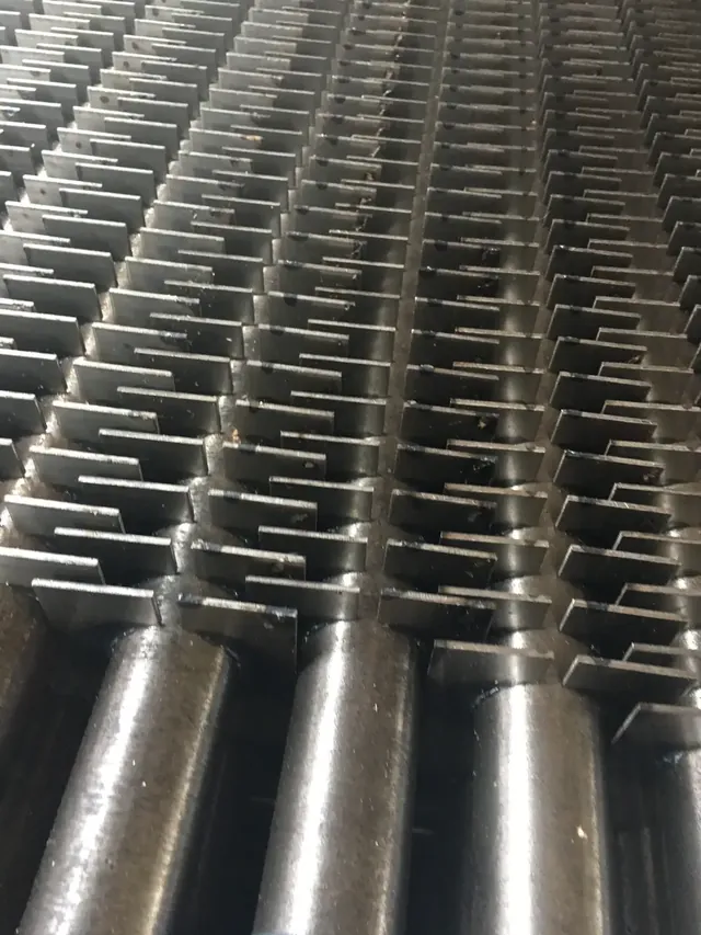 H type finned tubes stacked in the workshop