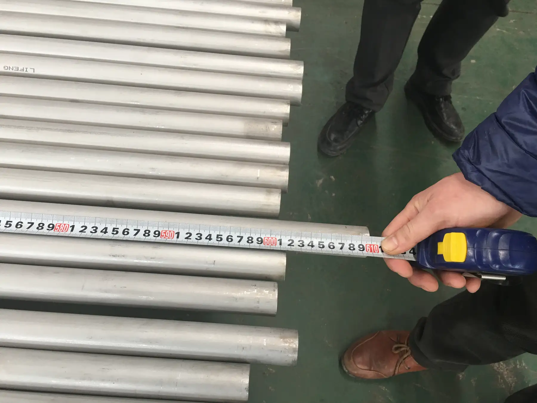 Tape measure used to check the length of finished tube