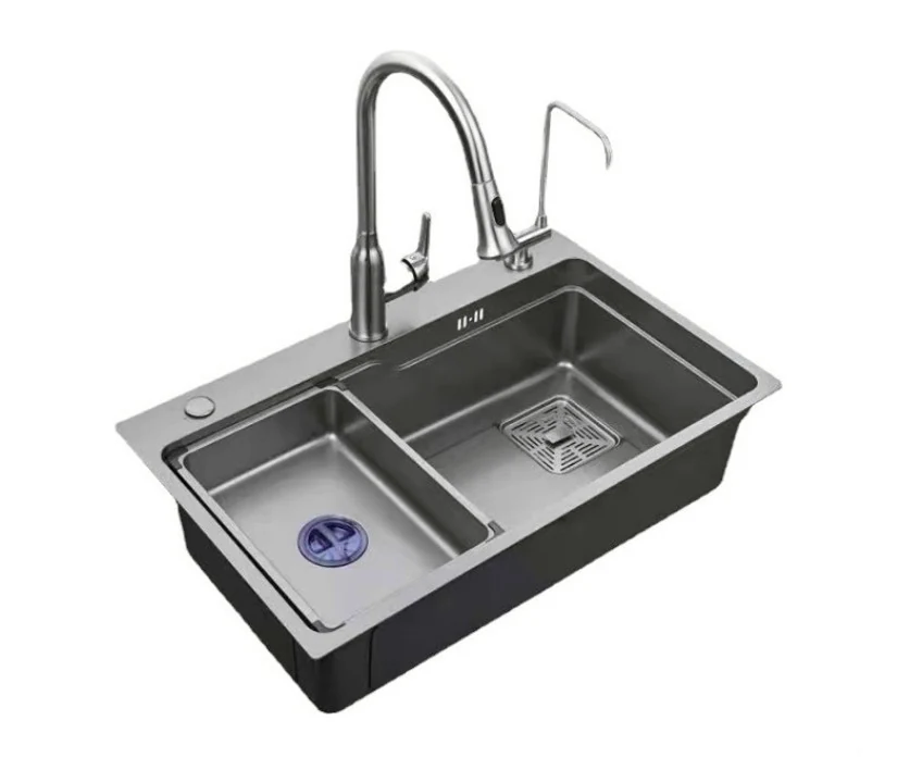 Multifunction sink with mixer tap, colander and drying rack in place