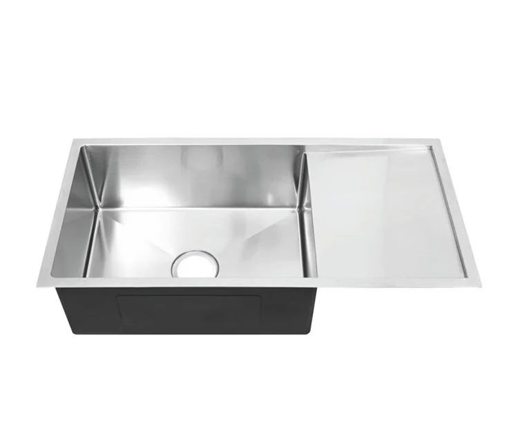 Undermount drainboard sink shown from above with the board to the right