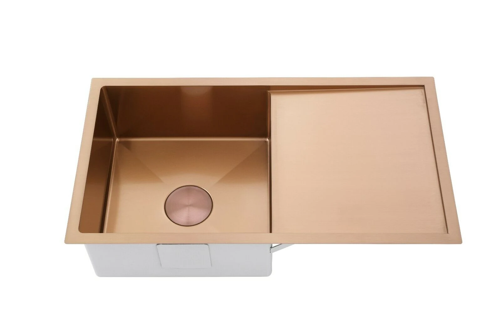 Drainboard sink finished in PVD copper with a matching drain