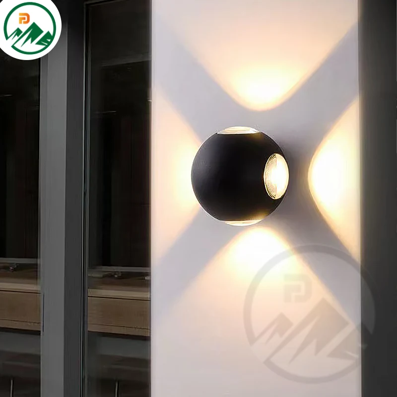Fixture mounted on a textured wall, showing light distribution at night