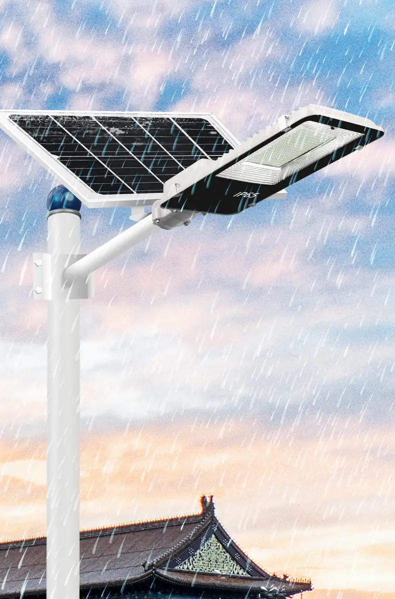 Solar street light installed on a pole illuminating a road at night