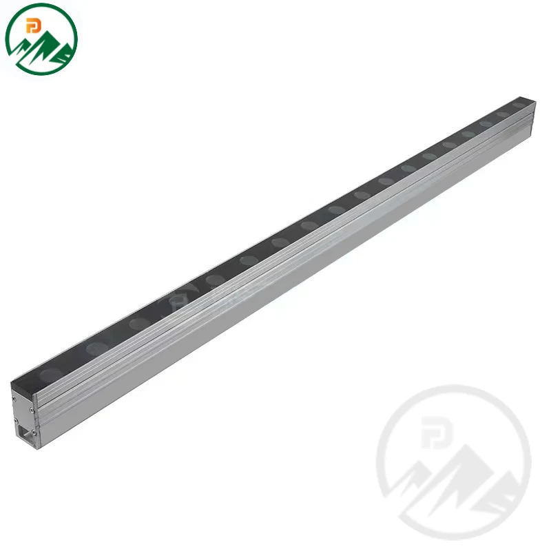 Linear LED fixture installed in a recessed channel in paving