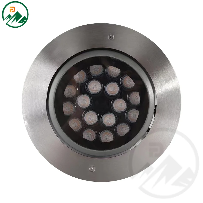 Recessed in-ground LED luminaire with the optic tilted inside the housing