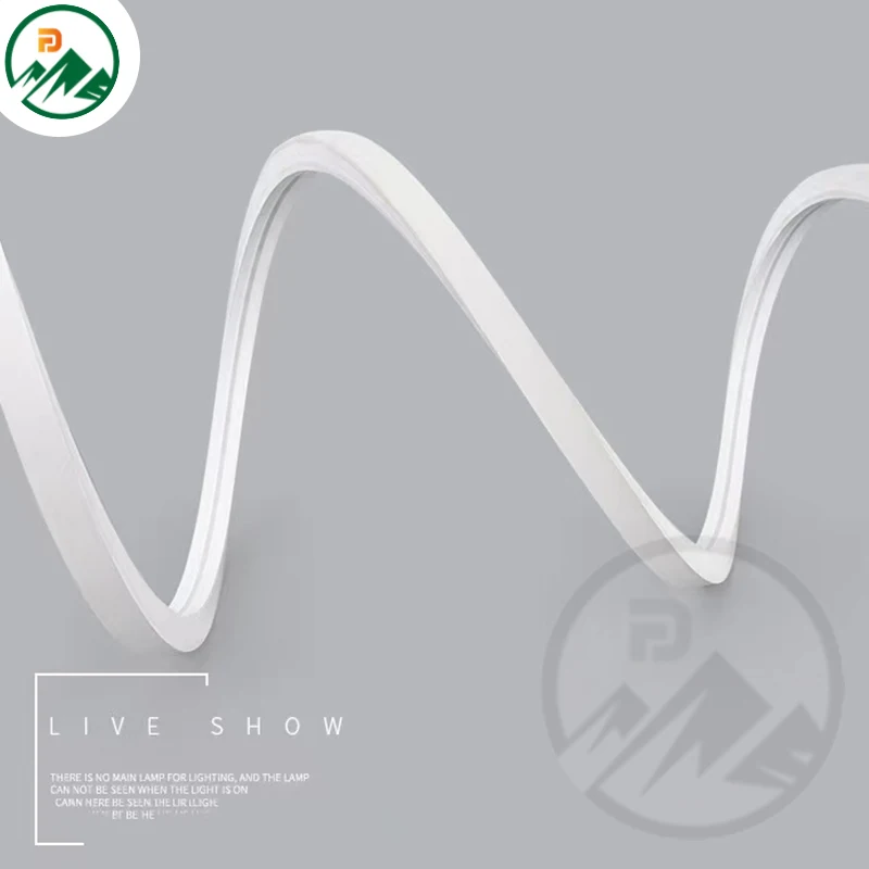 Installation of the LED strip on a curved surface in a commercial office ceiling
