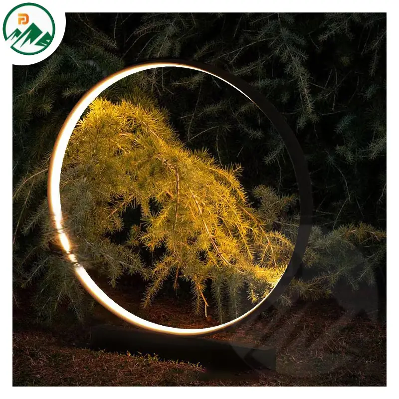 Installation of the garden light in a garden bed with soil and plants