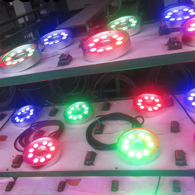 Underwater LED luminaire installed in a fountain jet with water flowing around it