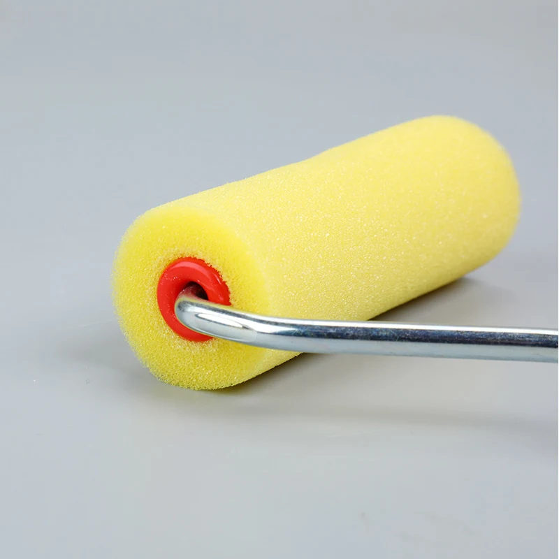 Side perspective of 4 inch yellow foam paint roller sleeve on red core