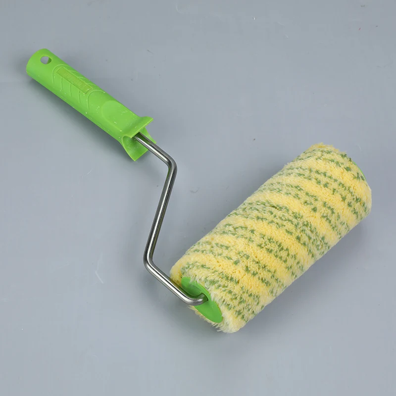 Paint roller with green plastic handle, metal frame, and yellow-and-green striped fabric sleeve on gray background