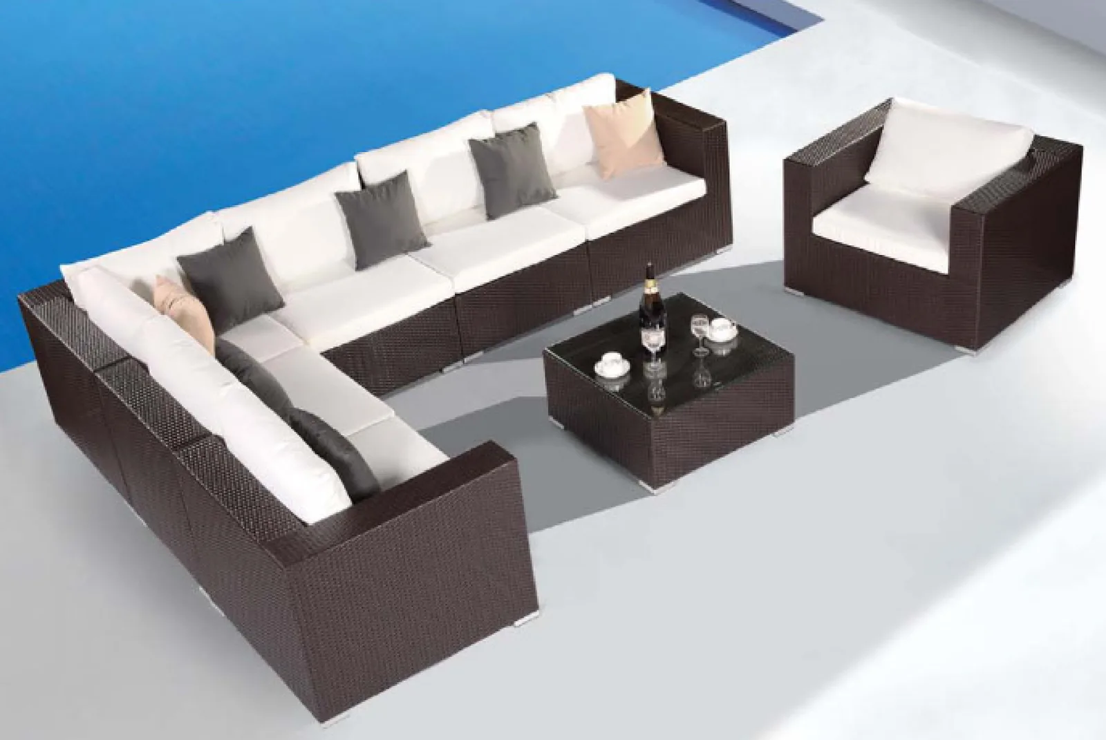 Rattan outdoor corner sofa set in dark brown weave with armchair coffee table and cream cushions