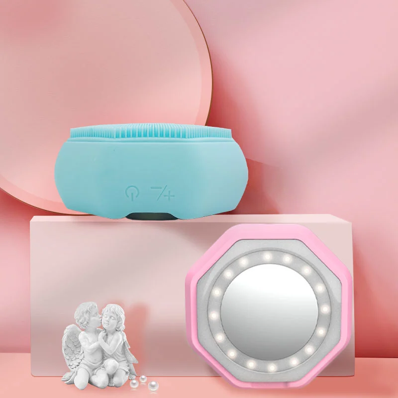 Close-up of the silicone brush head and LED panel on the device