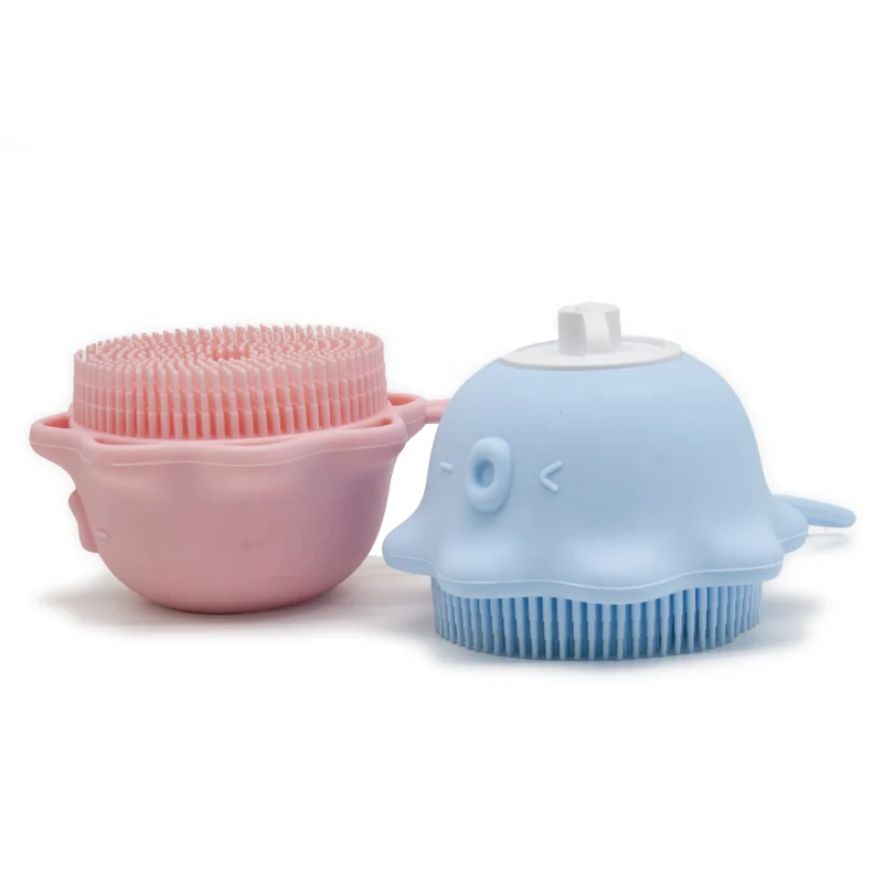 Baby bath brush shown with gel reservoir filled and ready for use