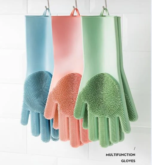 Close-up of the brush attachment on a silicone cleaning glove