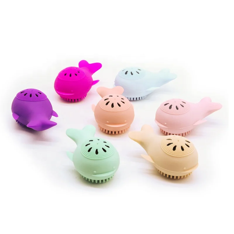 Close-up of the soft silicone bristles and whale-shaped handle
