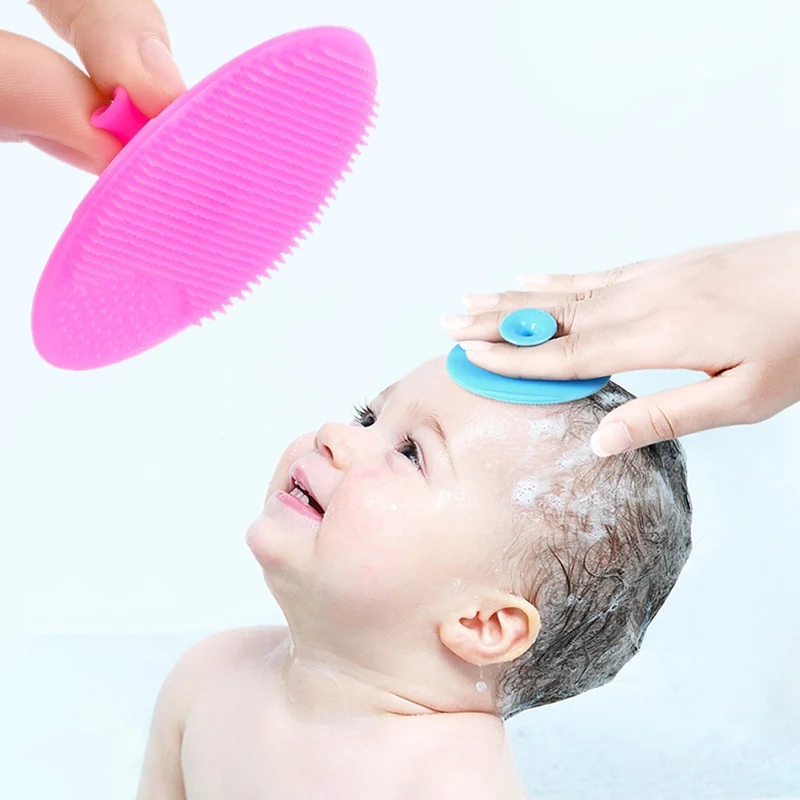 Close-up of soft silicone bristles on a baby hair washing brush
