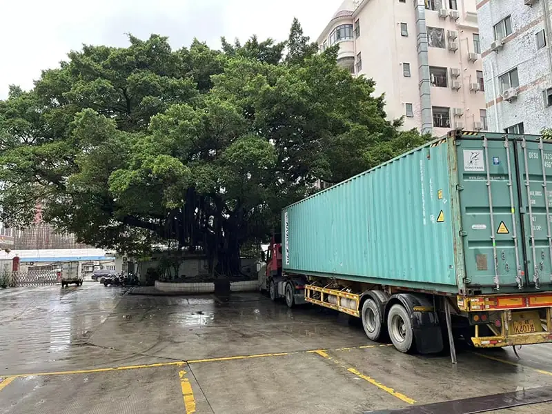 Finished goods leaving the factory for export.