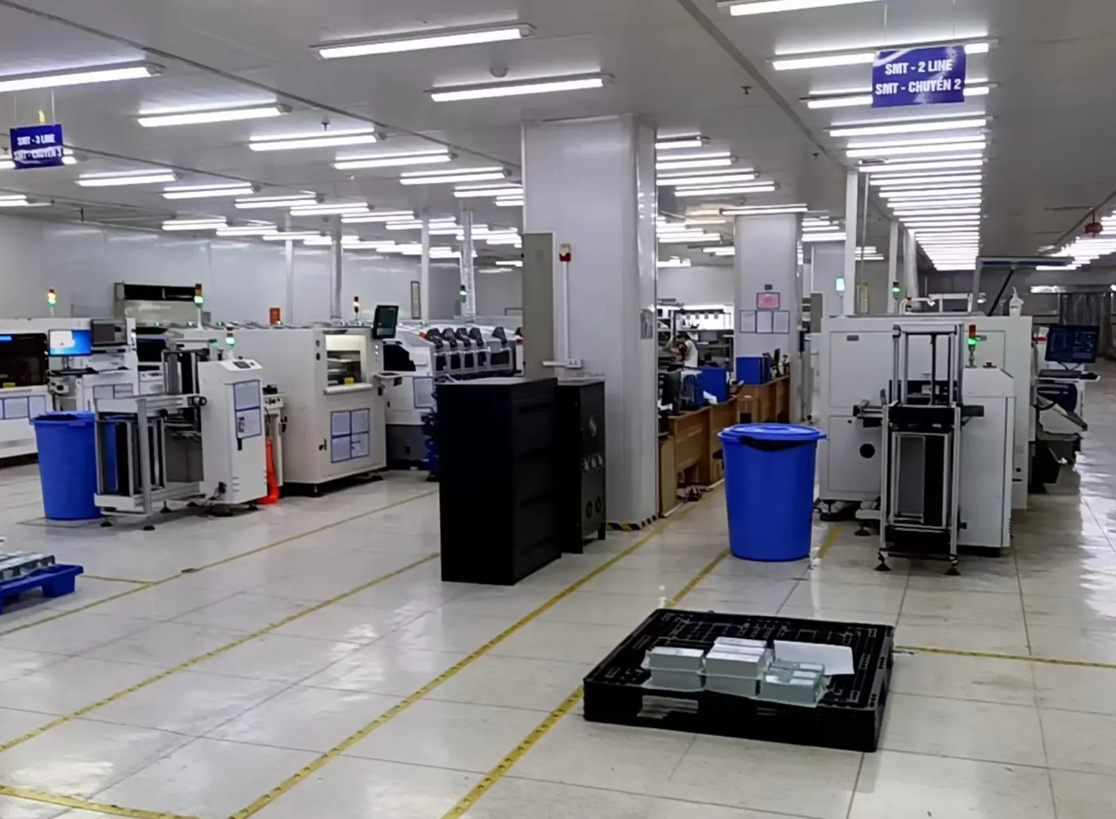 SMT line placing components for charger boards.