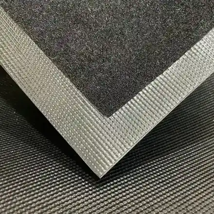 Custom printed motorcycle mats stacked in the factory