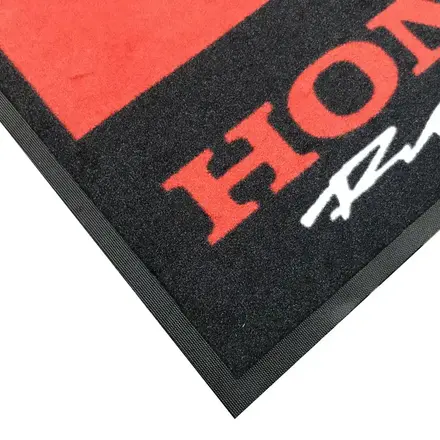 Entrance pit carpet installed at a showroom door