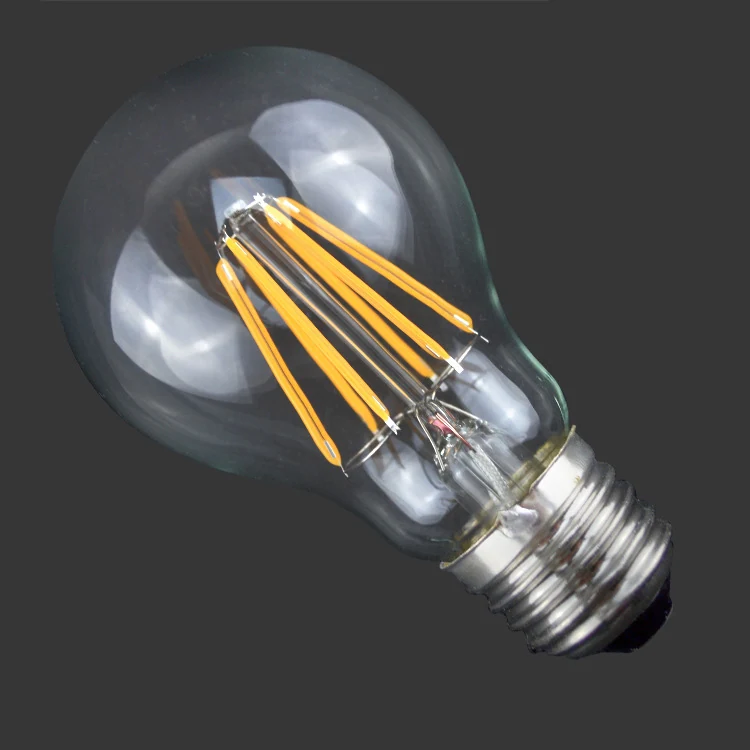 LED filament bulb showing four filament strips inside a clear glass envelope