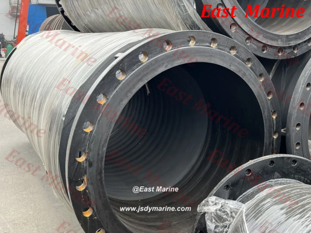 End view of an armored discharge hose showing the steel flange and rubber-lined bore