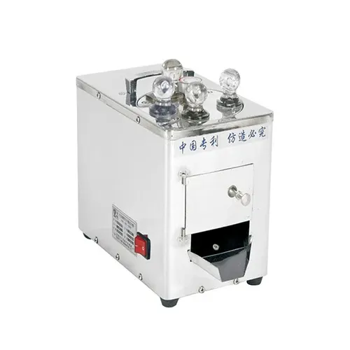 TCM Schneidemaschine für Rohkräuter DQ101