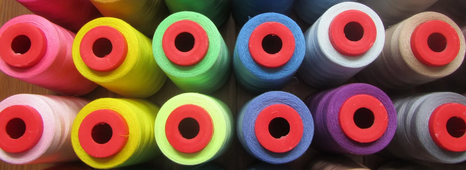 Dyed polyester thread cones ready for packing