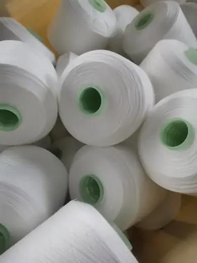 100% Spun Polyester Yarn 30S/2 on cone at the Hubei HuiLai Textile mill