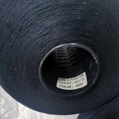 Colour-Dyed Spun Polyester Yarn 42S/2 on cone at the Hubei HuiLai Textile mill