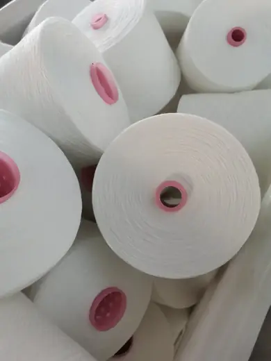 100% Spun Polyester Yarn 50S/3 on cone at the Hubei HuiLai Textile mill