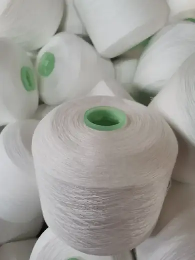 100% Spun Polyester Yarn 60S/3 on cone at the Hubei HuiLai Textile mill
