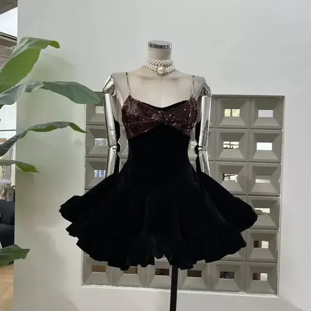 Black velvet puffball mini dress with burgundy sequin bust and crystal straps