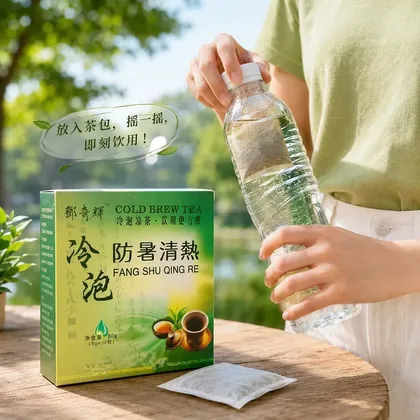 Cold brew tea product box with a tea bag beside it and a person inserting a tea bag into a bottle of water outdoors